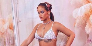 Фото дня: Rihanna в корсете и кружевных чулках рекламирует свою коллекцию нижнего белья